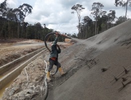 Spraying a layer of gunite after placed BRC steel mesh reinforcement